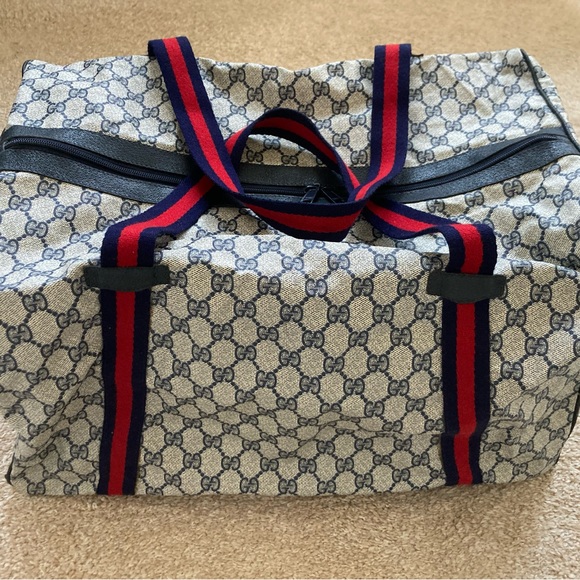 Gucci Handbags - Authentic Gucci Vintage GG Duffle Bag